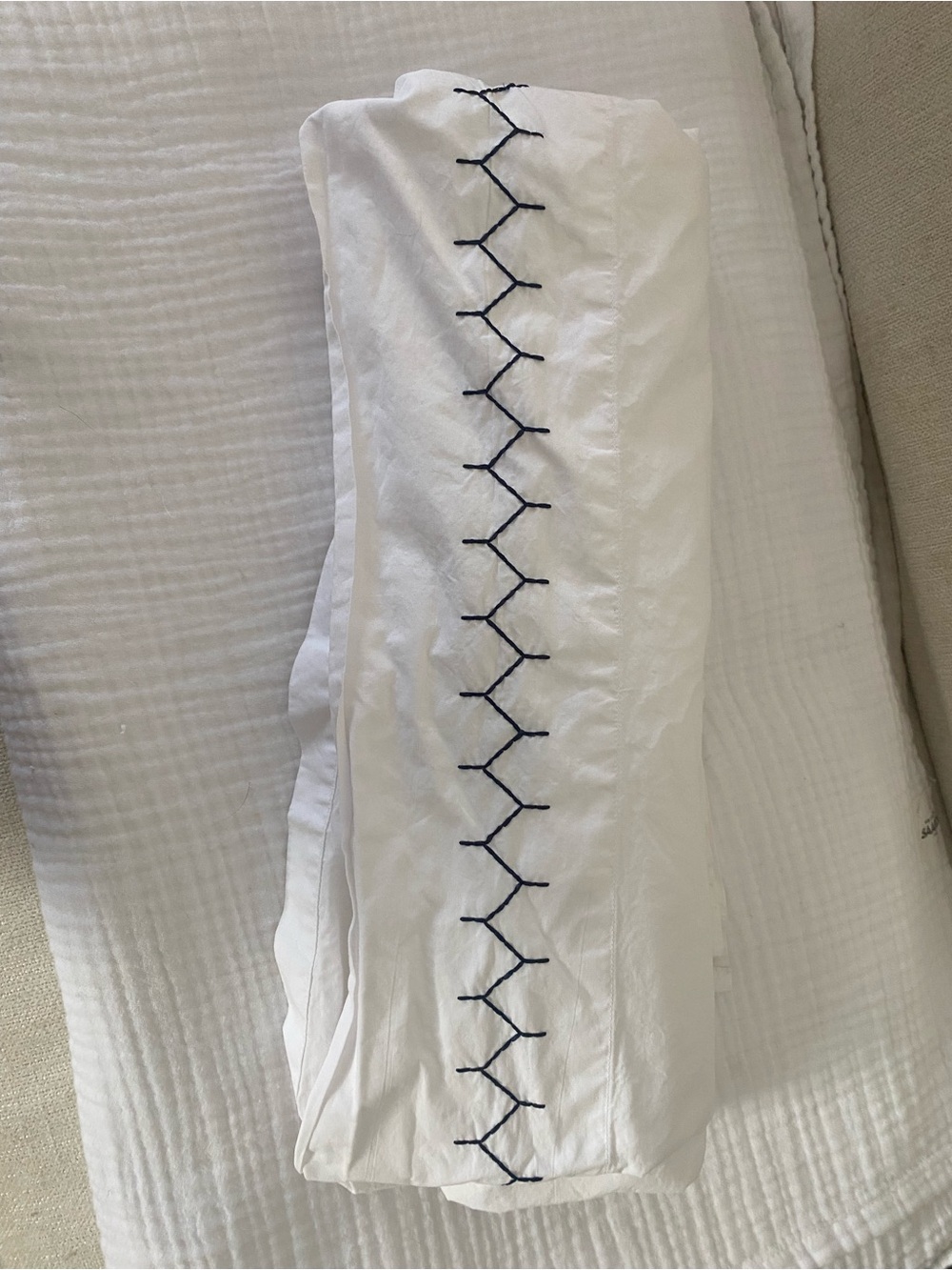 White twin sheet with Navy Embroidery